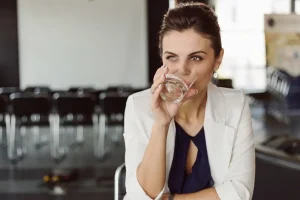 Woman Drinks Fresh Water